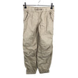 Unisex Lindex - Mittevenivad püksid, suurus 128 - 134 - Beige ()