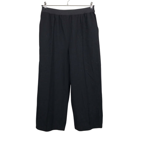 Unisex Arket - Mittevenivad püksid, suurus 42 - Must ()