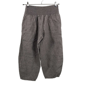 Unisex The Masai - Mittevenivad poolpikad püksid, suurus 38 - Pruun (3)