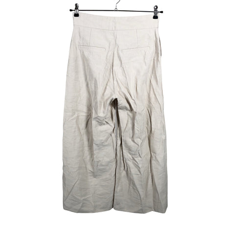 Unisex Lindex - Mittevenivad püksid, suurus 38 - Beige (2)