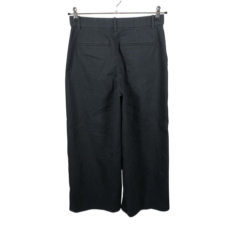 Unisex Uniqlo - Mittevenivad püksid, suurus 40 - Must (2)