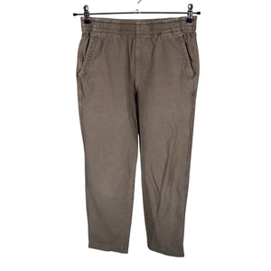 Unisex Uniqlo - Mittevenivad püksid, suurus 36 - Pruun (1)