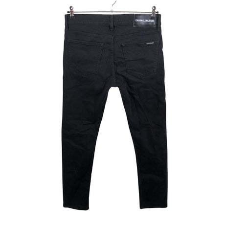 Unisex Calvin Klein Jeans - Teksad, suurus W33 - Must (2)