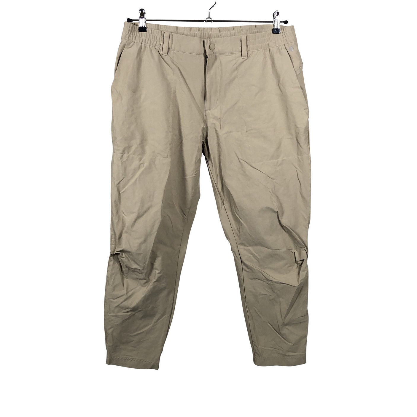 Unisex Adidas - Mittevenivad püksid, suurus W34 - Beige (1)