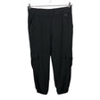 Unisex Claire.dk - Mittevenivad püksid, suurus 36 - Must ()