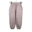 Unisex Nike - Dressikangast püksid, suurus 34 - Heleroosa ()