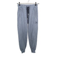 Unisex Adidas - Dressikangast püksid, suurus 34 - Helesinine ()