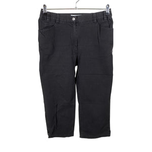 Unisex Voglia - Mittevenivad poolpikad püksid, suurus 42 - Must (1)