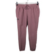 Unisex Under Armour - Õuepüksid, suurus M - Lilla ()