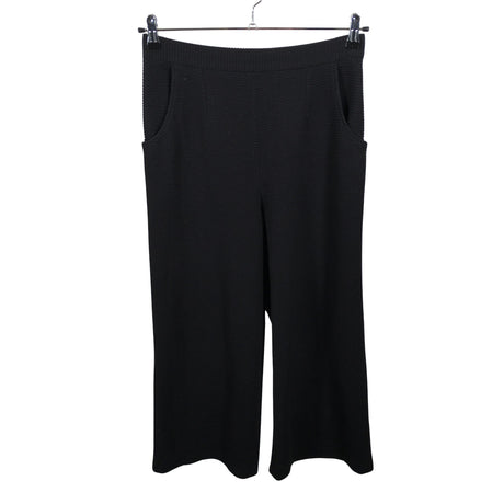 Unisex Uhana Design - Mittevenivad püksid, suurus 38 - Must ()