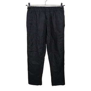 Unisex Hulmu - Mittevenivad püksid, suurus 34 - Must (1)