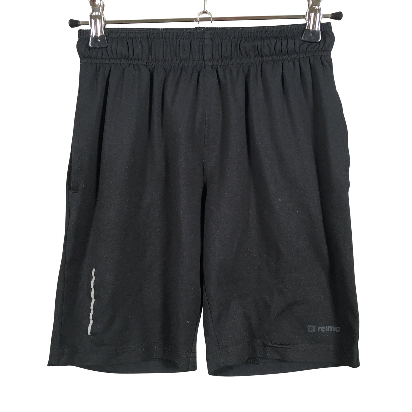 Unisex Reima - Trikotaažist lühikesed püksid, suurus 116 - 122 - Must (1)