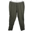 Unisex Uniqlo - Mittevenivad püksid, suurus XXS - Roheline ()
