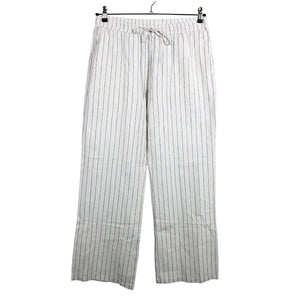 Unisex Madlady - Mittevenivad püksid, suurus 40 - Valge (1)
