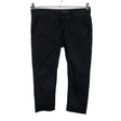 Unisex Krew - Mittevenivad püksid, suurus W28 - Must ()