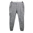 Unisex Urban Classics - Mittevenivad püksid, suurus L - Must ()