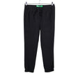Unisex Benetton - Mittevenivad püksid, suurus 36 - Must ()