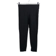 Unisex Benetton - Mittevenivad püksid, suurus 36 - Must ()