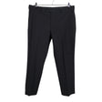 Unisex Uniqlo - Mittevenivad püksid, suurus XL - Must ()
