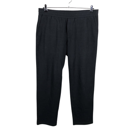 Unisex Arket - Mittevenivad püksid, suurus XL - Must ()