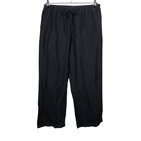 Unisex Uniqlo - Mittevenivad püksid, suurus 40 - Must ()