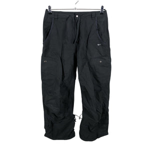 Unisex Nike - Mittevenivad püksid, suurus 38 - Must (1)