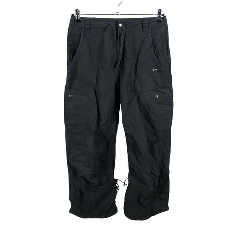 Unisex Nike - Mittevenivad püksid, suurus 38 - Must ()