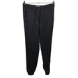 Unisex Holly & Whyte by Lindex - Mittevenivad püksid, suurus 36 - Must ()