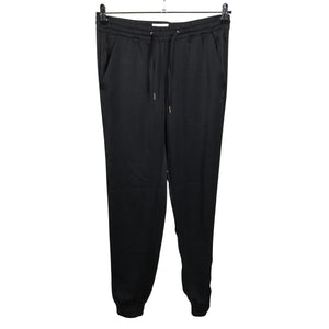 Unisex Holly & Whyte by Lindex - Mittevenivad püksid, suurus 36 - Must (1)