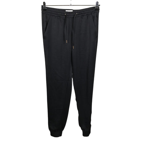 Unisex Holly & Whyte by Lindex - Mittevenivad püksid, suurus 36 - Must ()