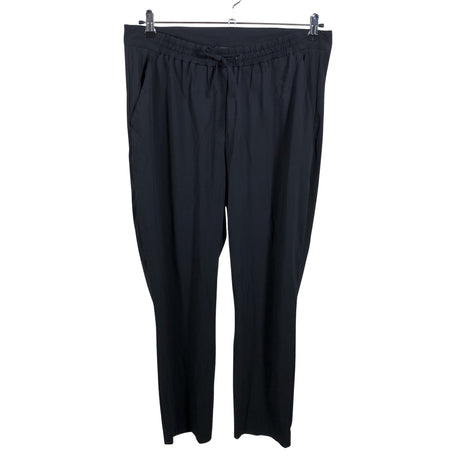 Unisex Peak Performance - Mittevenivad püksid, suurus 42 - Must ()