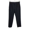 Unisex Uniqlo - Mittevenivad püksid, suurus M - Must ()