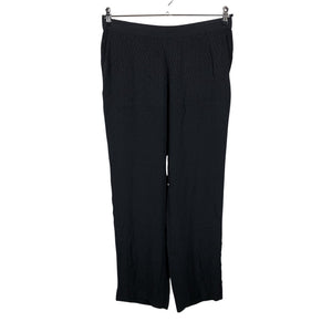 Unisex Aarikka - Mittevenivad püksid, suurus 38 - Must (1)