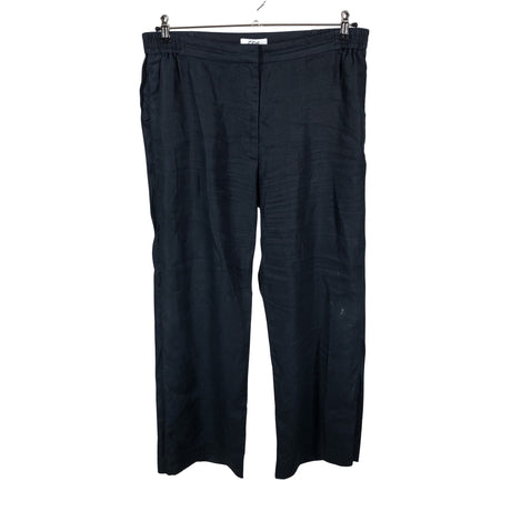 Unisex COS - Mittevenivad püksid, suurus 44 - Must ()