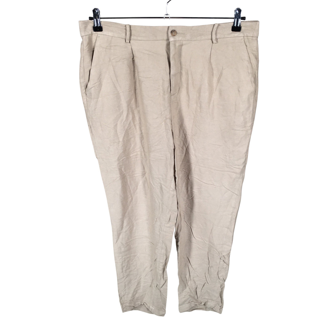 Unisex Noom - Mittevenivad püksid, suurus 44 - Beige (1)
