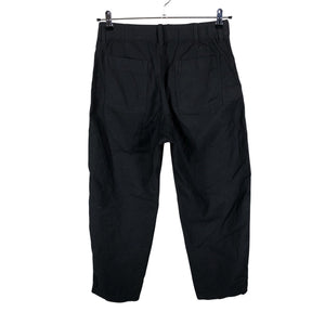 Unisex Uniqlo - Mittevenivad püksid, suurus 38 - Must (2)