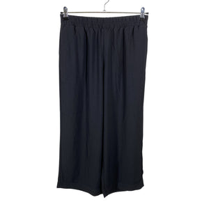 Unisex Lindex - Mittevenivad püksid, suurus 42 - Must (1)