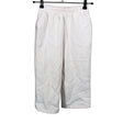 Unisex Next - Dressikangast püksid, suurus 98 - 104 - Heleroosa ()
