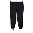 Unisex Team Place - Mittevenivad püksid, suurus 38 - Must ()