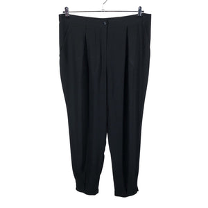 Unisex Marimekko - Mittevenivad püksid, suurus 40 - Must (1)