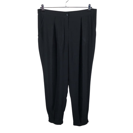 Unisex Marimekko - Mittevenivad püksid, suurus 40 - Must ()