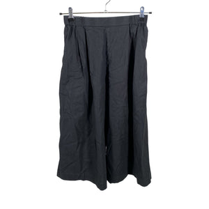 Unisex Uniqlo - Mittevenivad poolpikad püksid, suurus 38 - Must (1)