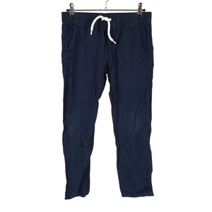 Unisex Lindex - Mittevenivad püksid, suurus 140 - 146 - Sinine (1)