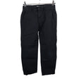 Unisex Lindex - Mittevenivad püksid, suurus 128 - 134 - Must ()