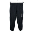 Unisex Nike - Dressikangast püksid, suurus 158 - 164 - Must ()