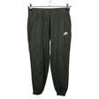 Unisex Nike - Dressikangast püksid, suurus 158 - 164 - Roheline ()