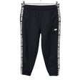 Unisex New Balance - Soojenduspüksid, suurus 36 - Must ()
