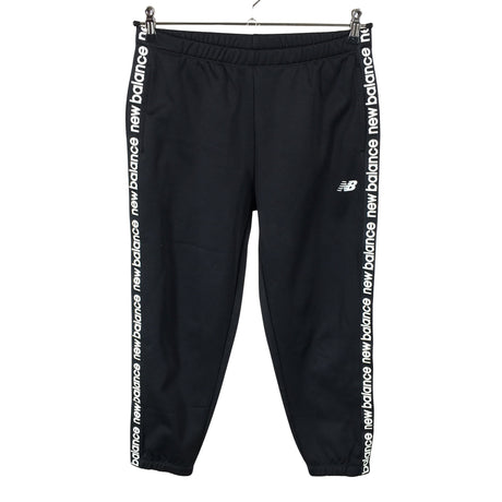 Unisex New Balance - Soojenduspüksid, suurus 36 - Must ()