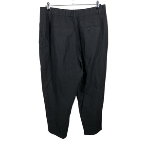 Unisex Uniqlo - Mittevenivad püksid, suurus 44 - Must (2)