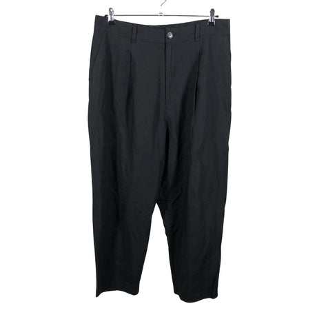Unisex Uniqlo - Mittevenivad püksid, suurus 44 - Must ()